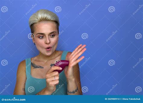 Surprised Blonde Woman Enjoying Of Vacuum Vagina Stimulator While Touching With Him To Her Hand