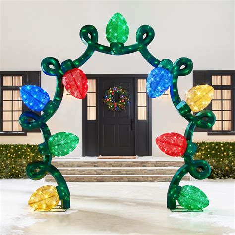 The 8 1/2' Illuminating Festive Archway - Hammacher Schlemmer