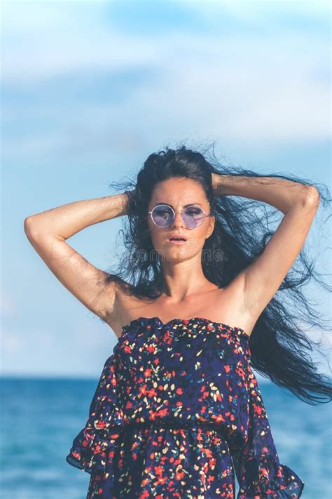 Young Woman Posing On The Tropical Beach Of Bali Island Indonesia