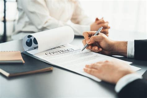 Closeup Businessman Sign Contract With A Pen In His Hand Equilibrium Stock Image Image Of