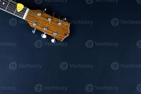 guitar and pick 13465796 Stock Photo at Vecteezy