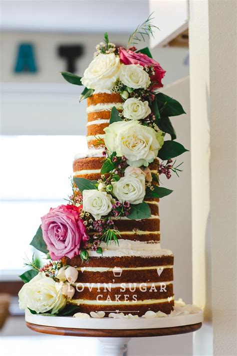 Elegant Naked Wedding Cake With Fresh Flower Cascade