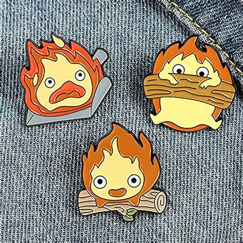 Howl S Moving Castle Calcifer Pin Collectio Fire Demon Spirit Log Bacon