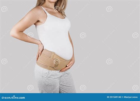 Pregnant Woman Belly In Prenatal Pregnancy Maternity Belt Orthopedic