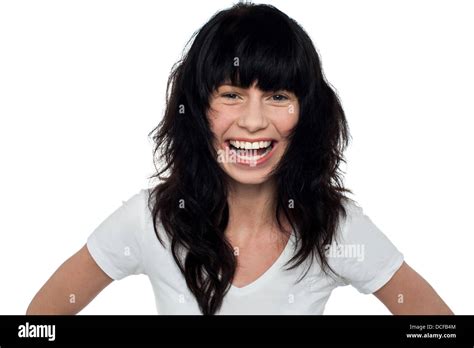 Attractive Cheerful Brunette Girl With Long Hair Laughing Heartily Stock Photo Alamy
