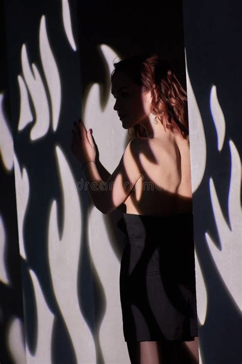 Beautiful Woman In Elegant Black Evening Dress Brunette Girl With Long Healthy And Shiny Curly