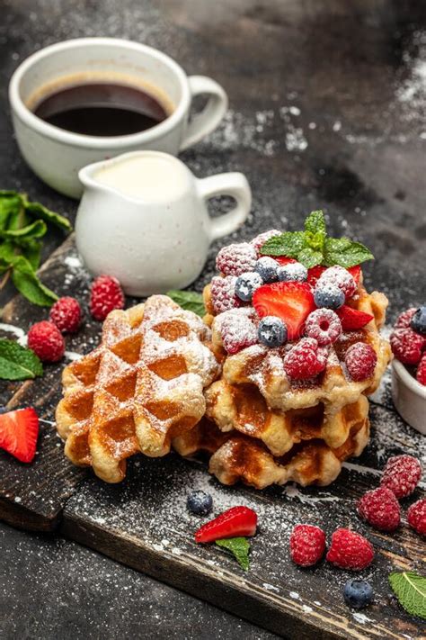 Belgian Waffles With Raspberries Strawberries And Blueberries Sugar