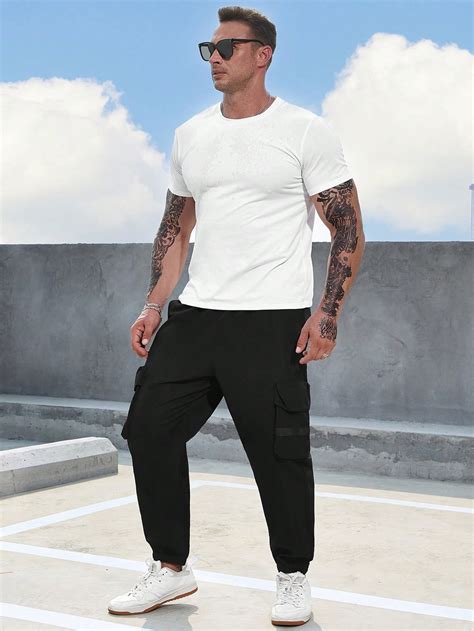 Manfinity LEGND Men S Plus Loose Fit Cargo Pants With Flap Pockets On