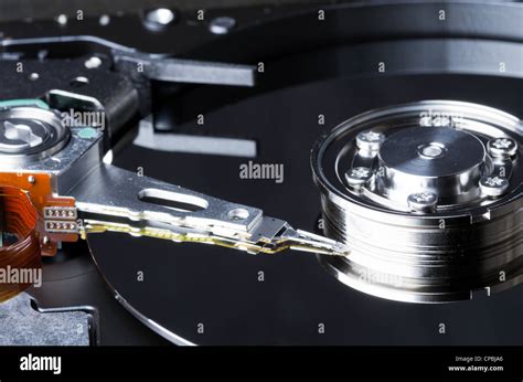 The platter and internals of a computer hard disk Stock Photo - Alamy