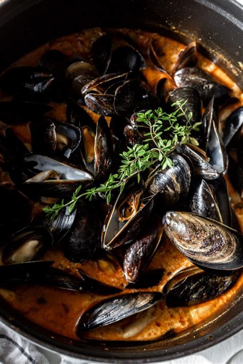 Steamed Mussels In Saffron Chorizo Broth Cooking With Cocktail Rings