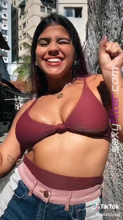 Magnetic Julia Antunes Shows Cleavage In Appealing Red Bikini Top