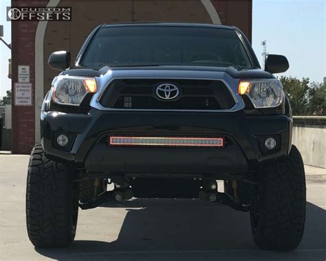 2015 Toyota Tacoma With 20x12 44 Hostile Sprocket And 29555r20 Toyo Tires Open Country Rt And