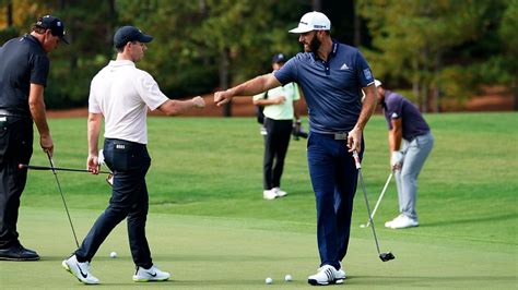 Rory Mcilroy Of Northern Ireland And Dustin Johnson Acknowledge Each