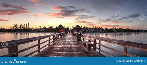 Early Sunrise Over the Naples Pier on the Gulf Coast of Naples, Stock ...