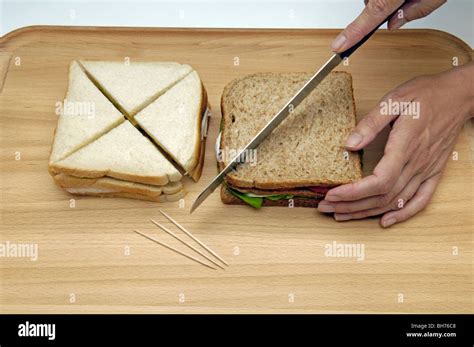 Cutting Sandwiches Stock Photo Royalty Free Image 27818232 Alamy