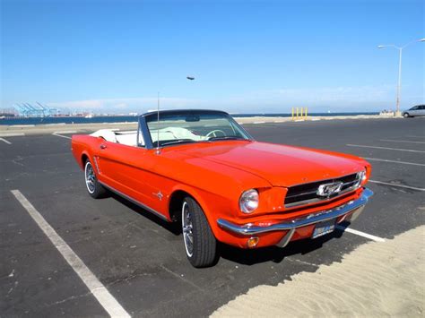 Orange Mustang Convertible by the Ocean