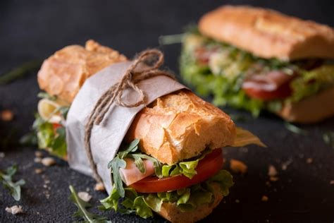 Premium Photo Baguette Sandwich With Cheese Ham Tomatoes And Vegetables