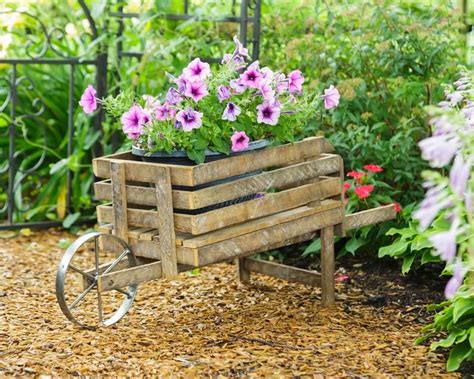 Reclaimed Wood Wheelbarrow Planter Rustic Garden Decor Etsy In 2020 Rustic Garden Decor