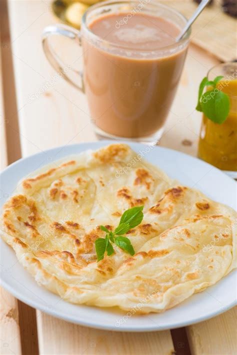 Roti Canai And Teh Tarik Very Famous Drink And Food In Malaysia Stock