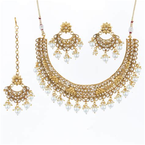 Gold And Multi Color Kundan Necklace Set With Earrings And Maang Tikka