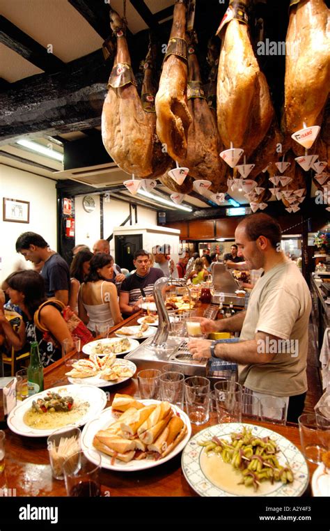 Eating Tapas At A Bar In San Sebastian Spain Stock Photo Alamy