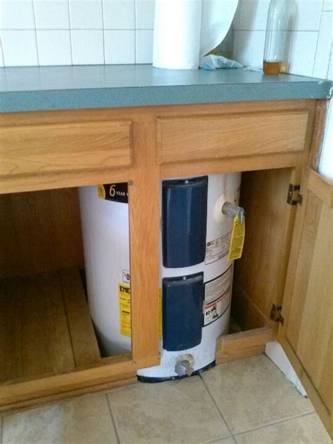 Water Heater In Kitchen Cabinet Or Buy A Big One And Transfer To House