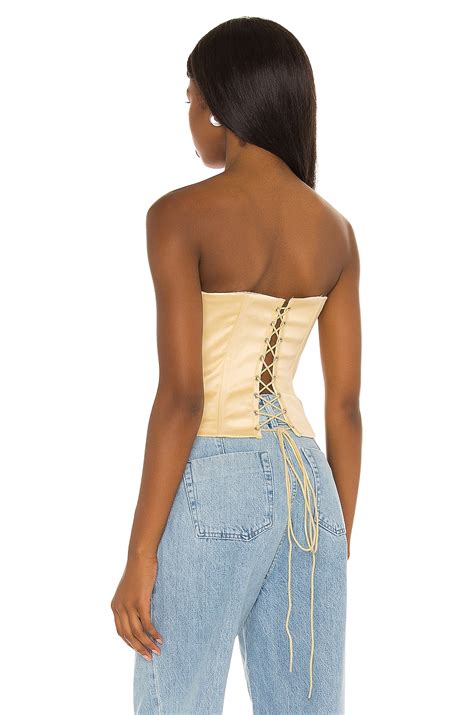 DANIELLE GUIZIO Satin Lace Up Corset In Pale Yellow REVOLVE