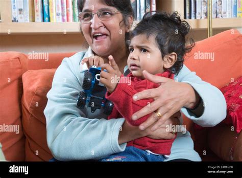 Grandmother Holding Grandson Stock Photo Alamy