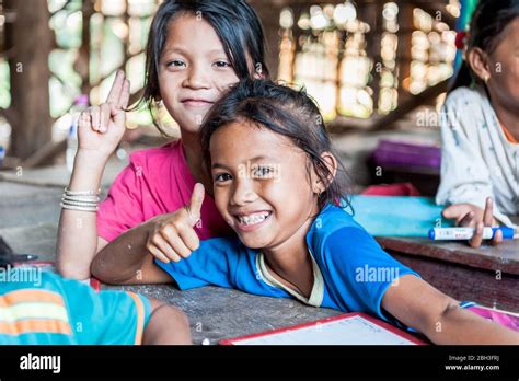 Cambodian School Children Smile For The Camera In A School In The