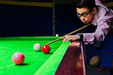 Snooker Player Placing the Cue Ball for a Shot Stock Image - Image of ...