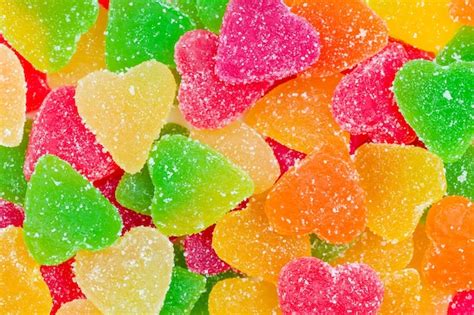 Premium Photo | Colorful fruit candy in sugar in the form of hearts