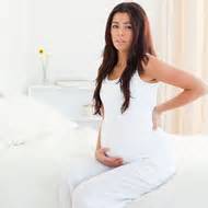 Causes & Symptoms of Upper Abdominal Pain During Pregnancy