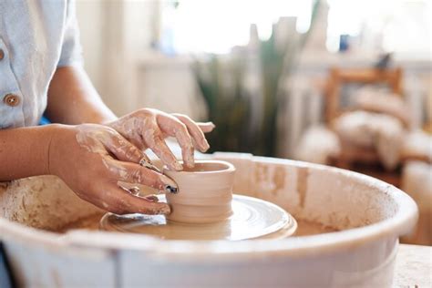 Premium Photo Female Potter Making A Pot On Pottery Wheel Woman