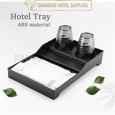hotel amenity trays toothbrush soap water cup electric kettle stepped
