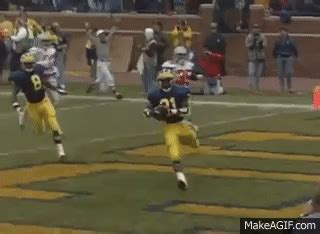 Greatest punt return ever! Desmond Howard Heisman Pose on Make a GIF