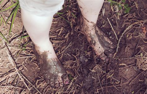 Girls Legs In Mud Closeup Stock Photo Download Image Now Istock