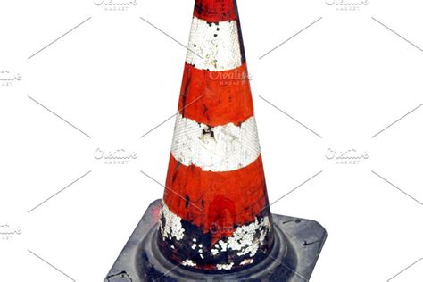 A Red And White Striped Traffic Cone