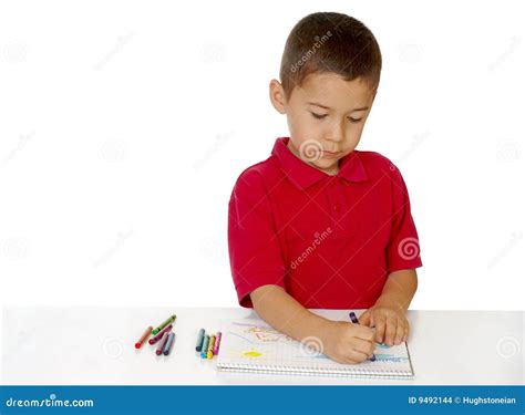 Boy coloring with crayons stock photo. Image of artist - 9492144