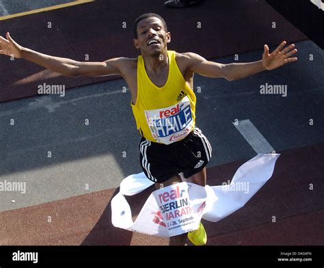 Cheering Ethiopian Marathon Runner Haile Gebrselassie Reaches The Finish Line Of Berlin