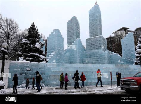 Visitors Walk By The St Paul Winter Carnival Ice Palace Before Its