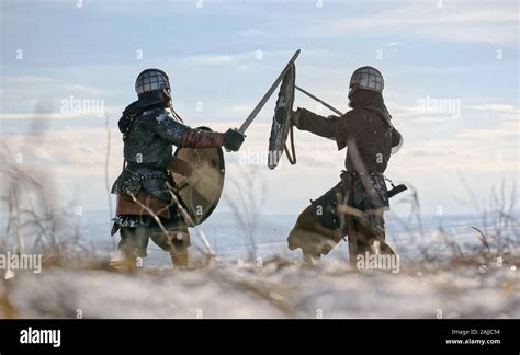 Two warriors fighting two fighting warriors hi-res stock photography ...