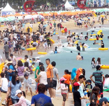 Vacationers Cool Off At Haeundae Beach In Busan Sunday The