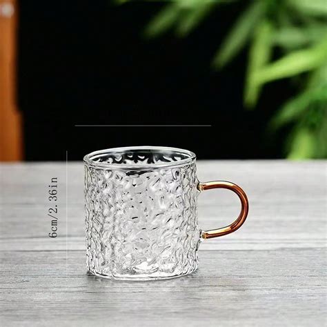 Conjunto de 4 tazas de café de vidro transparente con mango azul y