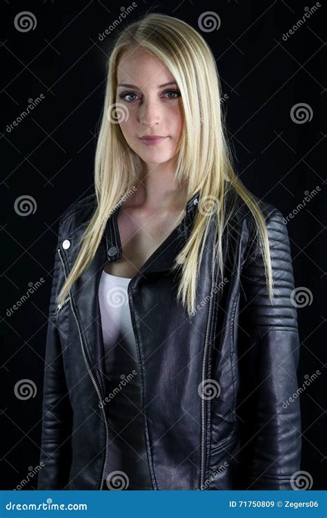 Beautiful Blonde Girl Wearing A Black Leather Jacket Stock Image