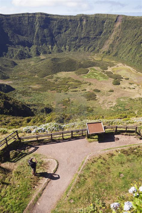 Tourists admiring Caldeira volcano in Faial, Azores by mrfotos ...