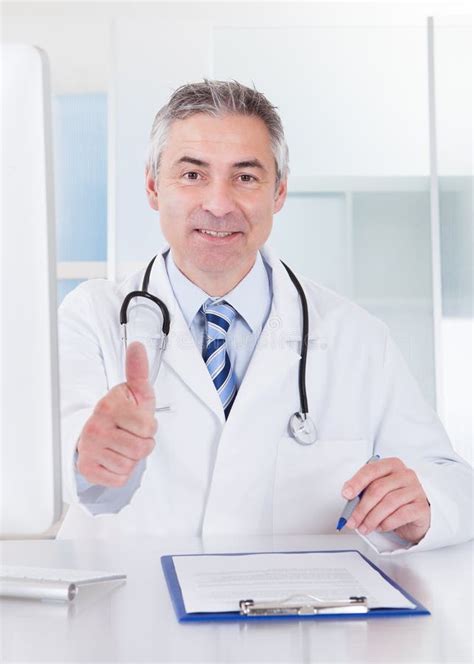 Mature Male Doctor Showing Thumbs Up Sign Stock Photo Image Of Mature Occupation