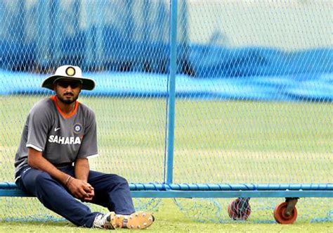 Harbhajan Singh takes a break during training | ESPNcricinfo.com