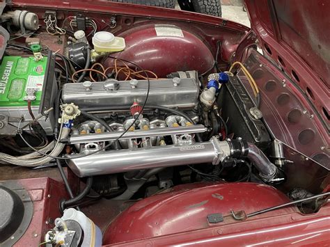 Wrapping up a port injection swap for this TR6 : r/littlebritishcars