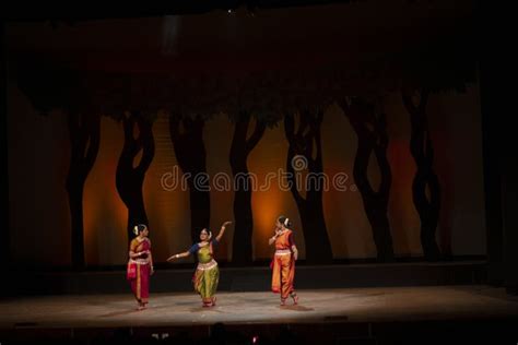 Three Odissi Dancers Performing Odissi Dance On Stage Editorial Image