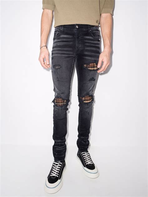 Amiri Ripped Finish Skinny Jeans Black Farfetch